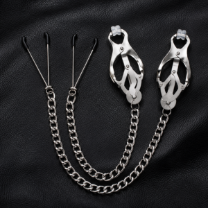 Stainless steel nipple clamps featuring clover and tweezer styles with connecting chains on black leather.