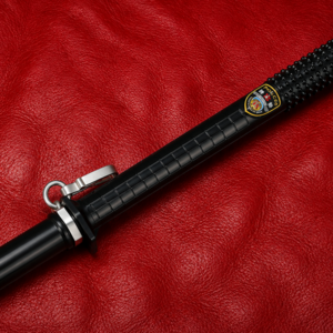 Rubber Nightstick Thumper displayed on a premium red leather background.